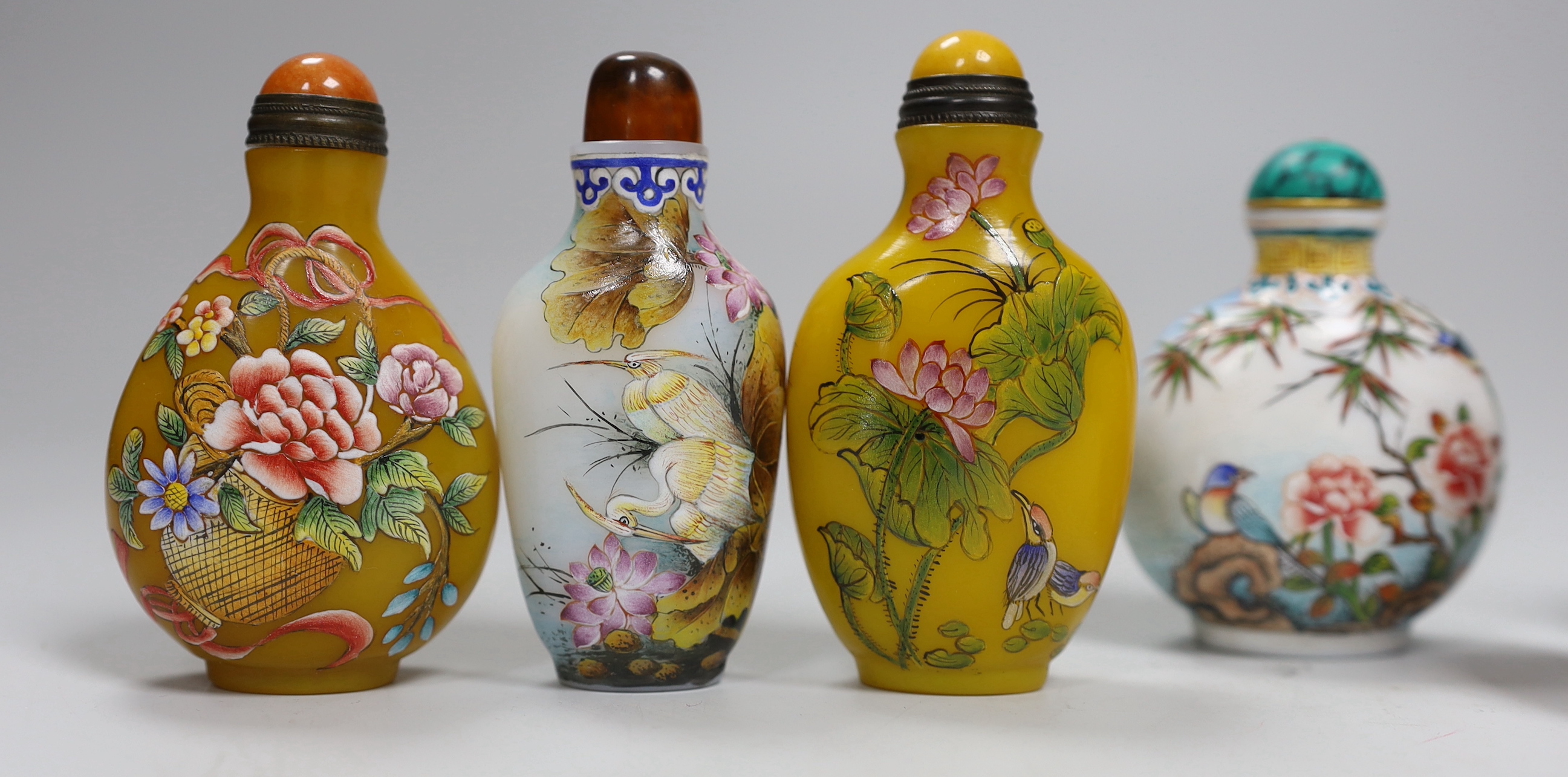 Seven Chinese enamelled glass bottles, tallest 9cm high